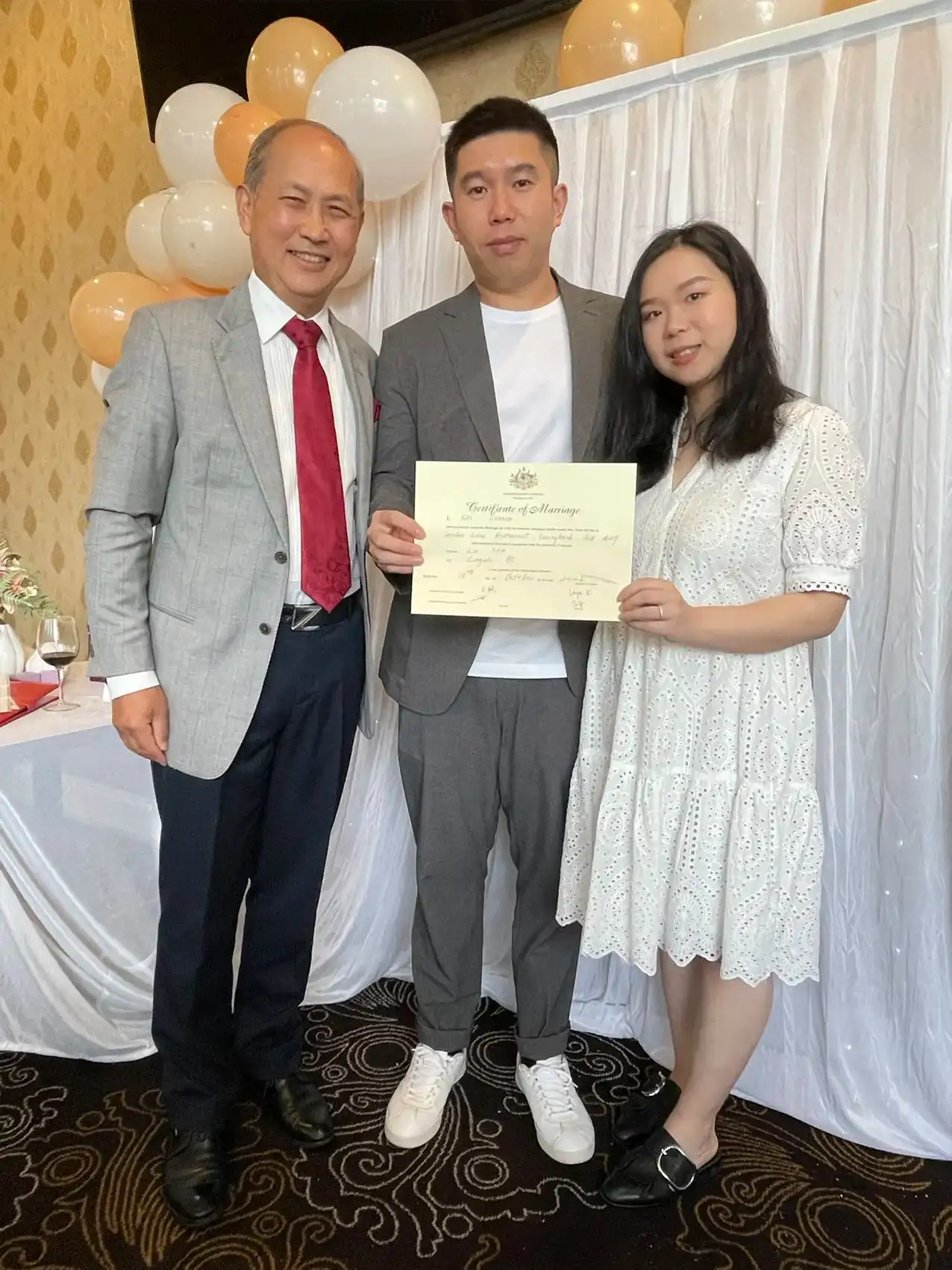 Sunnybank-wedding-couple-photo-holding-certificate-happy
